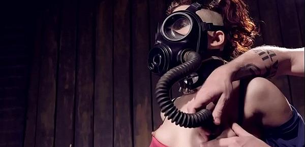  Redhead with gas mask tormented